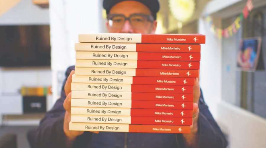 pic of author and stack of Ruined By Design